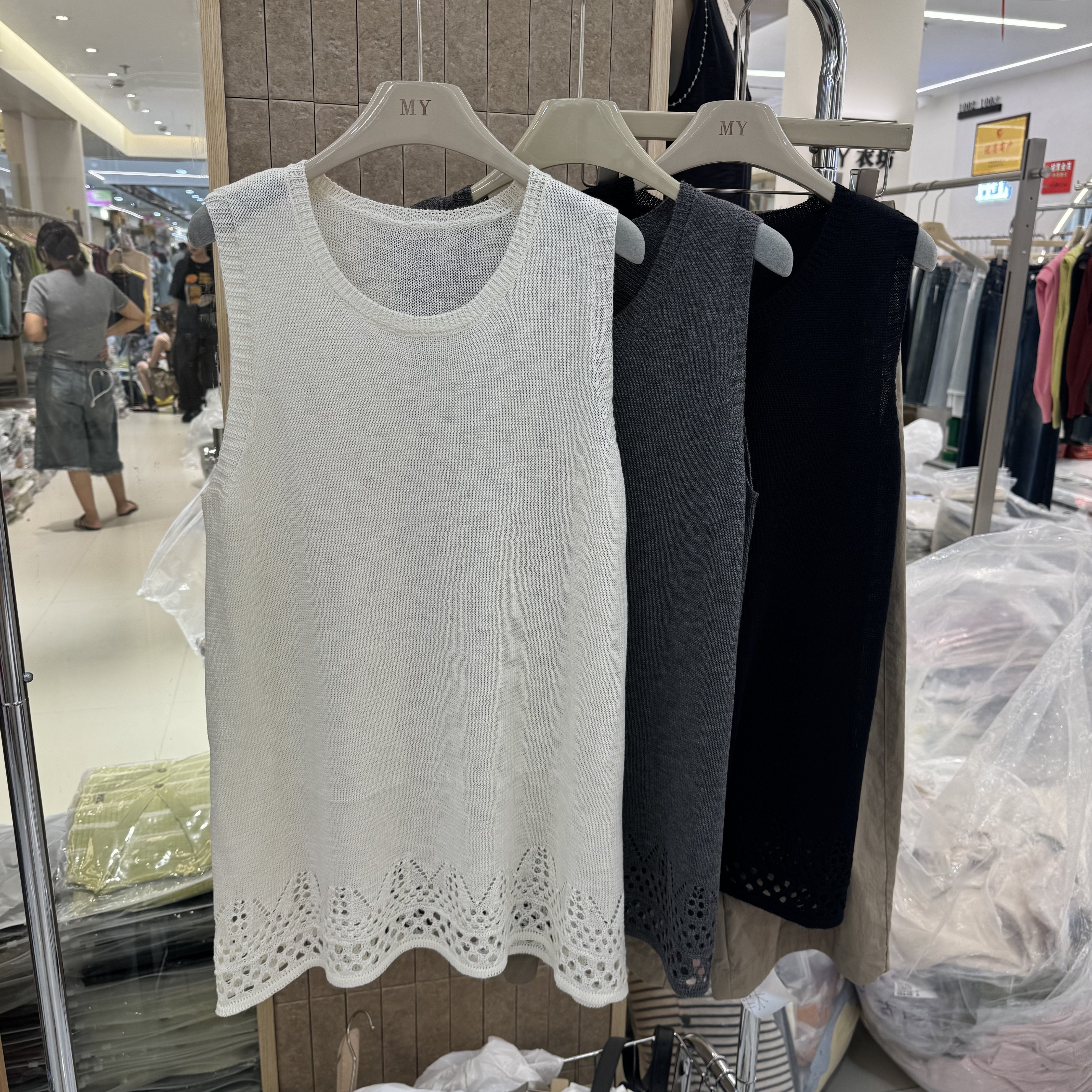 韩系纯色镂空简约针织背心慵懒分风叠穿镂空针织上衣9952
