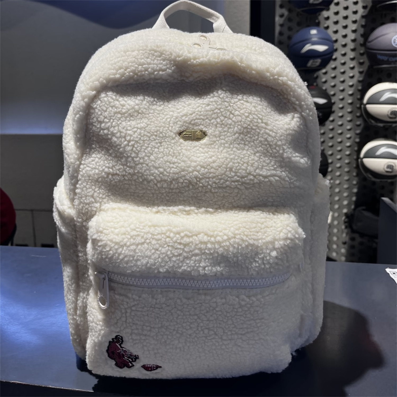 李宁 男女运动休闲潮流卡通刺绣羊羔绒毛绒双肩背包书包 ABSV361