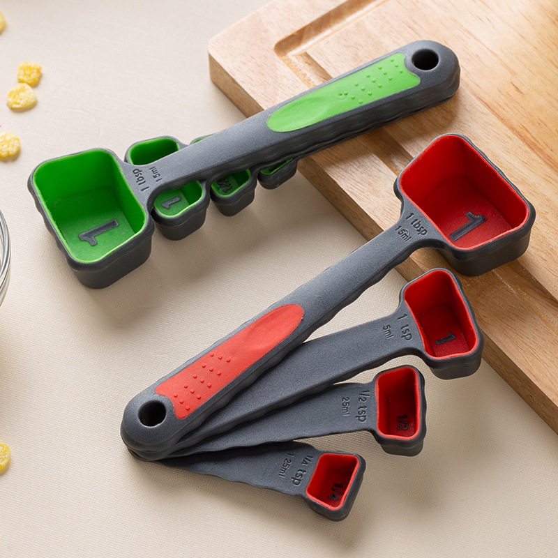 Measuring spoon, measuring cup, plastic, with scale markings