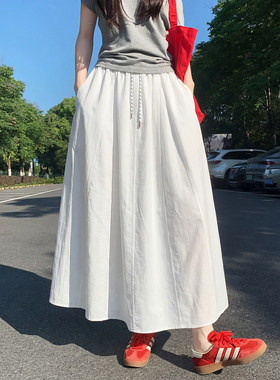 夏季裙子白色半身裙女2026新款薄口袋纯色垂感a字小个子裙子长款