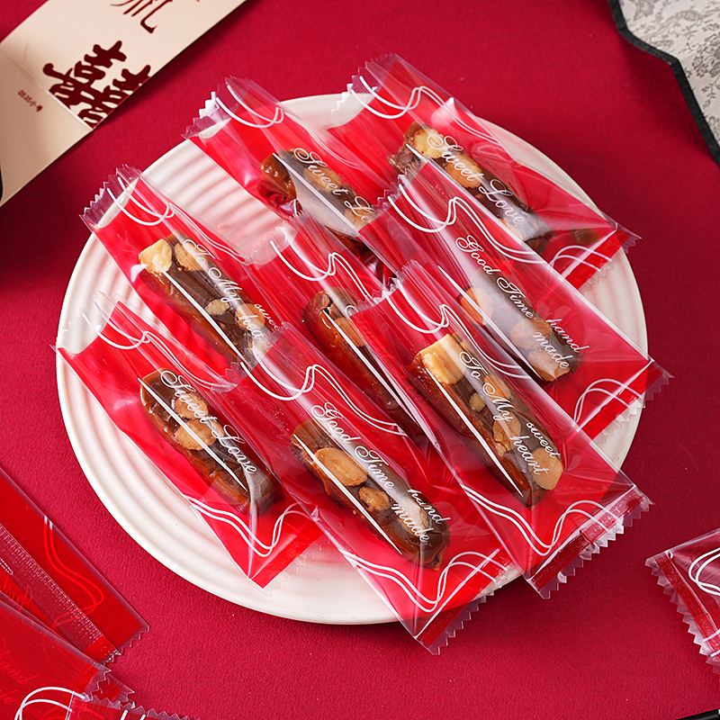 新年喜庆太妃糖包装袋牛轧糖海盐杏仁机封袋咖啡糖雪花酥糖果袋子