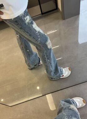 网红同款潮牌自主复古拼皮牛仔裤时尚浅色拼接磨破微喇叭宽松长裤