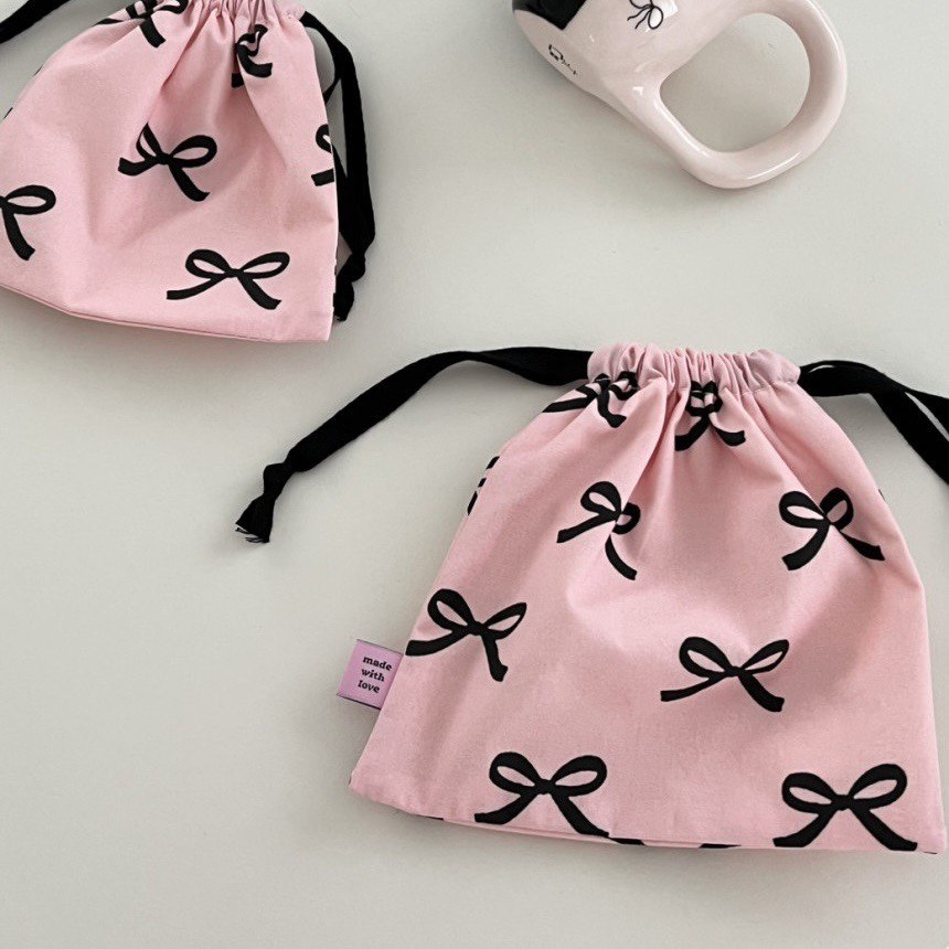 蝴蝶结抽绳束口袋化妆包姨妈包