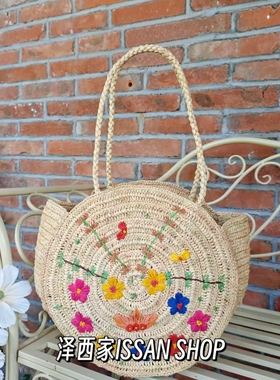 法式复古小众花朵刺绣单肩草编包夏手工拉菲草圆饼包沙滩编织包