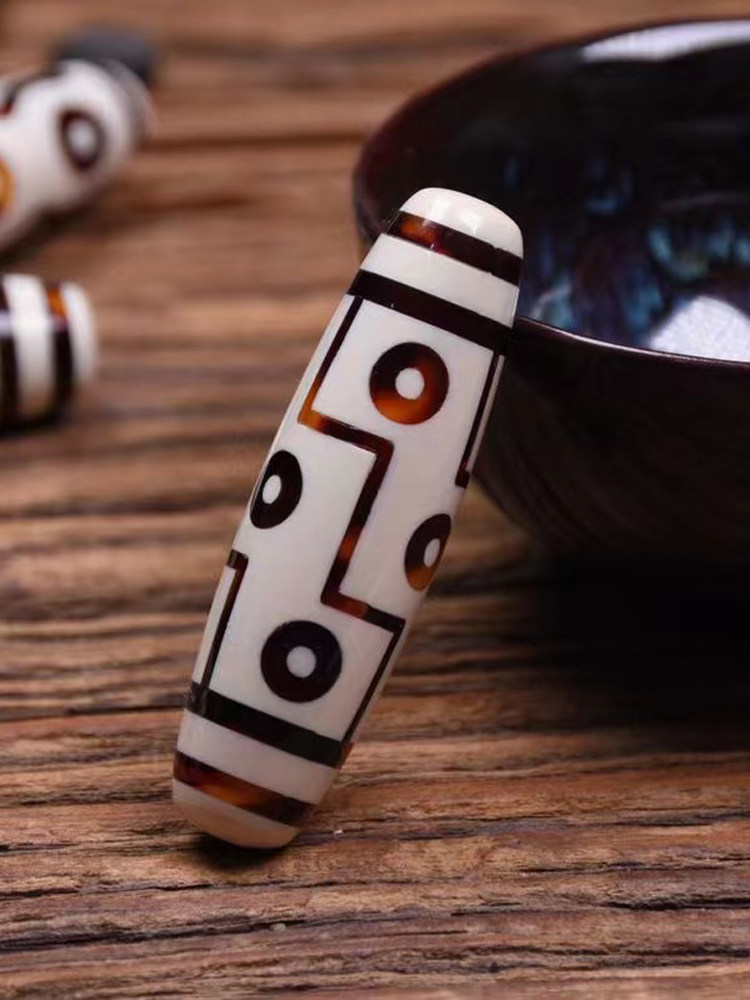 守艺猛犸象牙雕刻纯手工九眼天珠猛犸牙吊坠挂件牌子