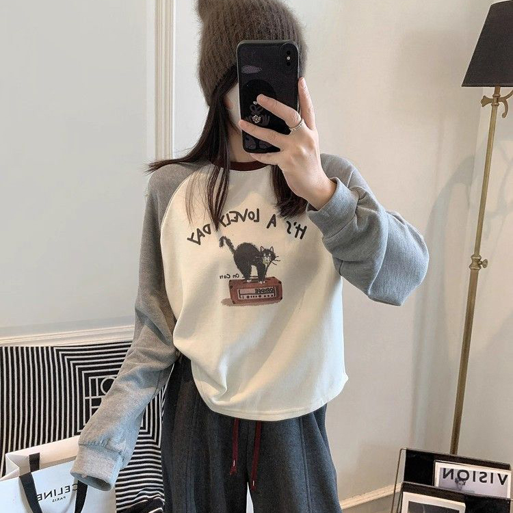 胖mm特大码300斤小猫印花撞色拼接长袖T恤女春秋宽松减龄内搭上衣