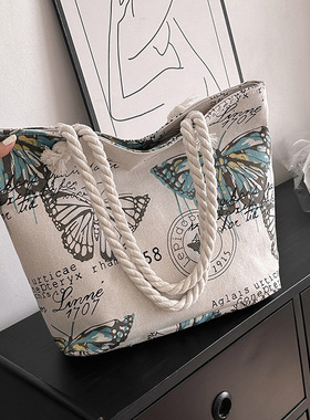 创意印花单肩大包包新款休闲时尚帆布女包韩版单肩斜跨粗绳沙滩包