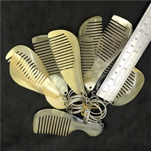 天然黄牛角长6-8厘米左右牛角小梳包包梳打小孔钥匙扣梳刘海梳