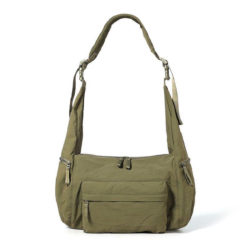 2026侧拉链袋男女运动休闲单肩斜挎平板杂志旅游包可拆背带大包潮