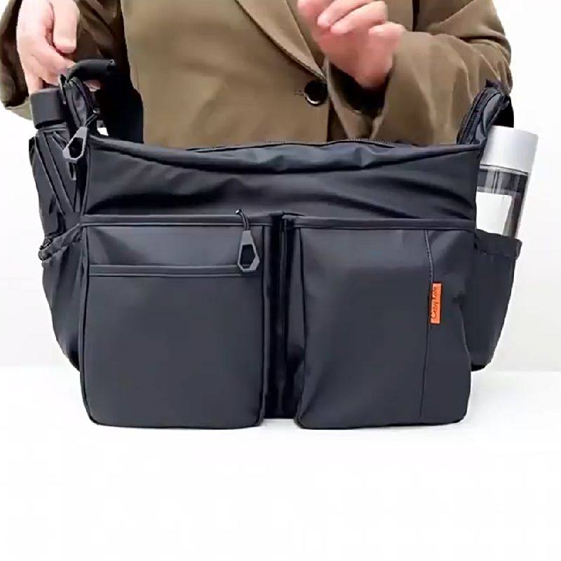 2026防水皮膜软滑横款侧装小水瓶伞的男士单肩斜挎A4杂志平板背包