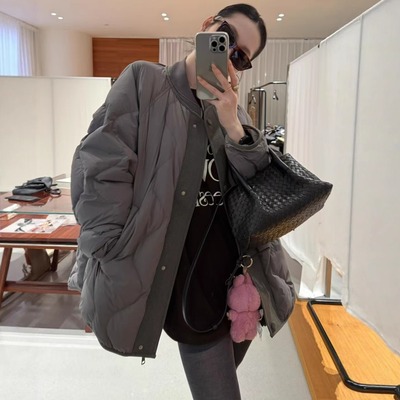 波浪压线一手长A字版羽绒服