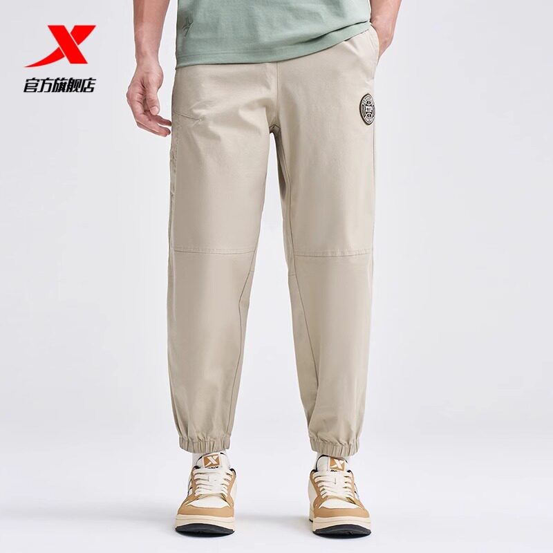 特步运动裤男裤2025秋季篮球宽松收口束脚梭织九分裤976329690285