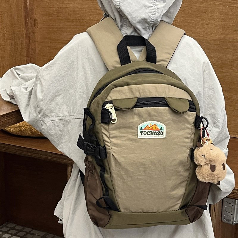 儿童双肩包2025新款时尚拼接潮童背包旅行包幼儿园宝宝男女童书包