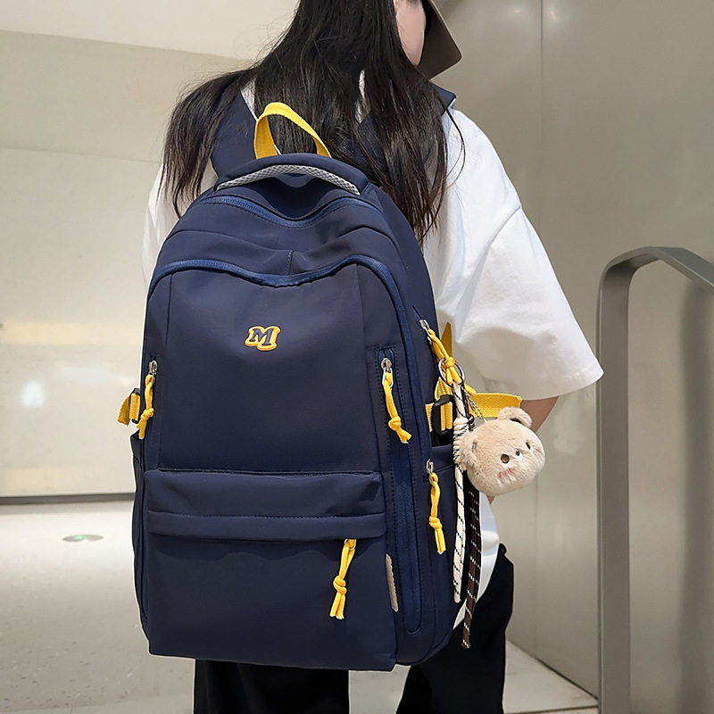 韩版ins书包女中学生大容量简约纯色背包高中生校园旅行双肩包男