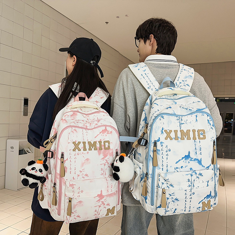 新款书包国潮扎染高颜值情侣休闲背包高品质气垫青少年学生双肩包