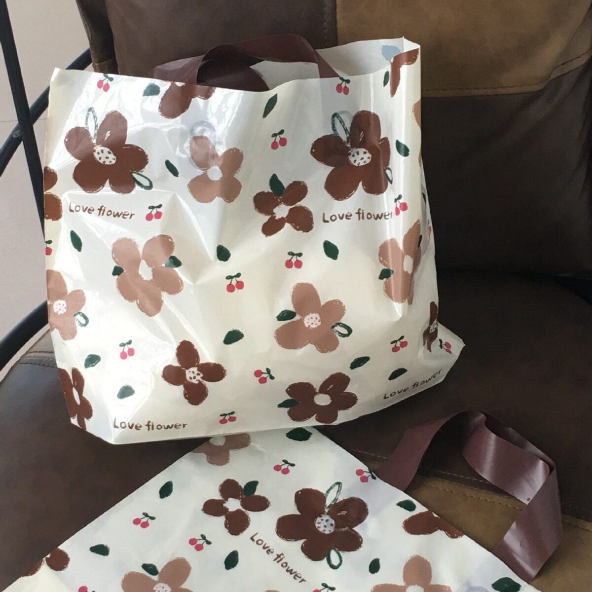 便宜批发服装店用包装袋塑料手提袋子高颜值制logo衣服手拎胶袋