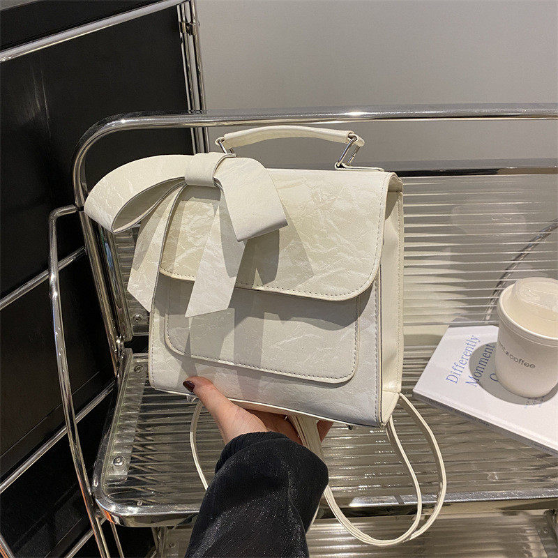 蝴蝶结多用双肩包包女新款潮时尚学院风百搭手提书包旅行背包