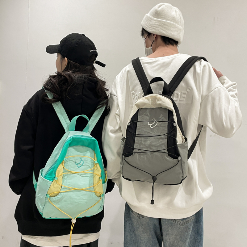 迷人布拼色软双肩包防水户外登山