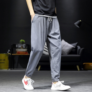 推荐春季男士休闲裤子宽松韩版潮束脚哈伦裤运动9分裤K801,黑色修身裤子搭配潮图片