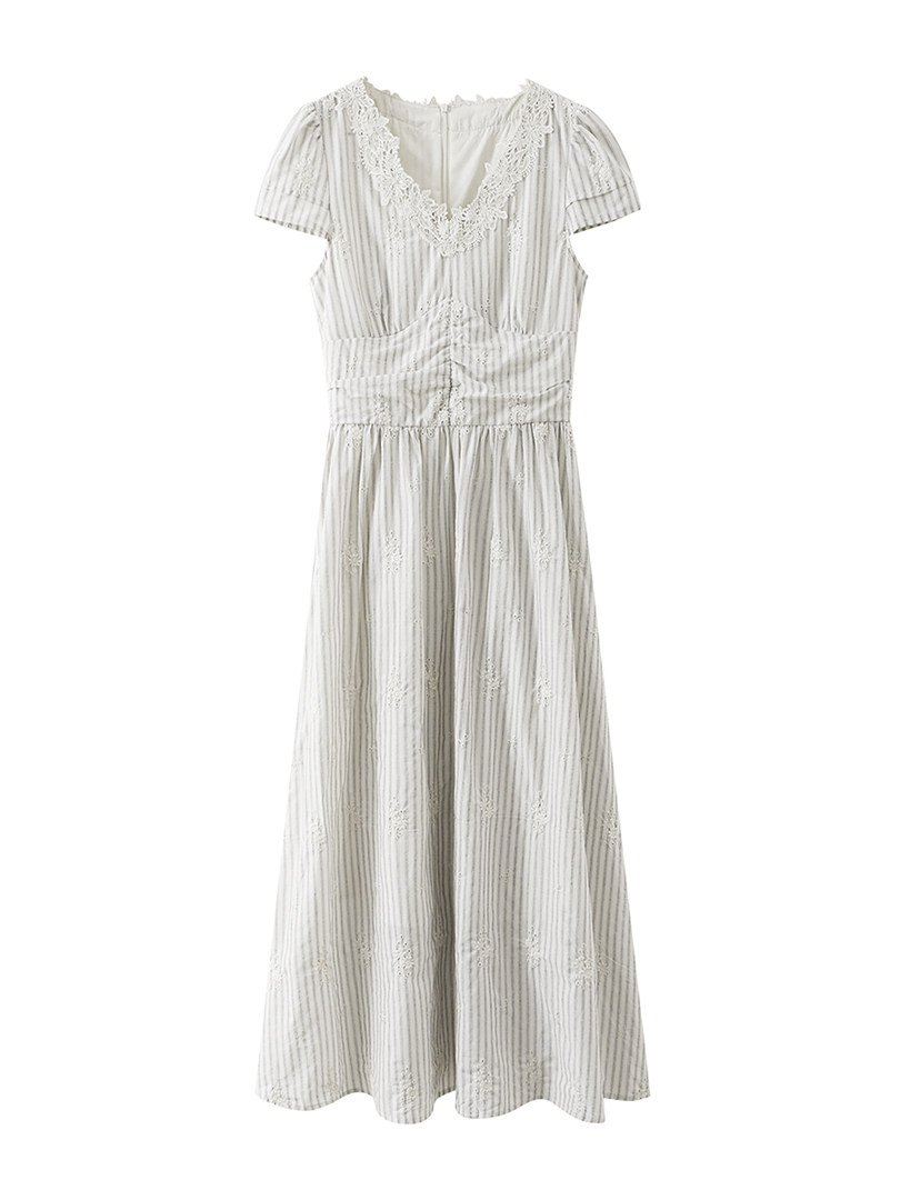 White short-sleeve lace-trimmed long dress on a plain background