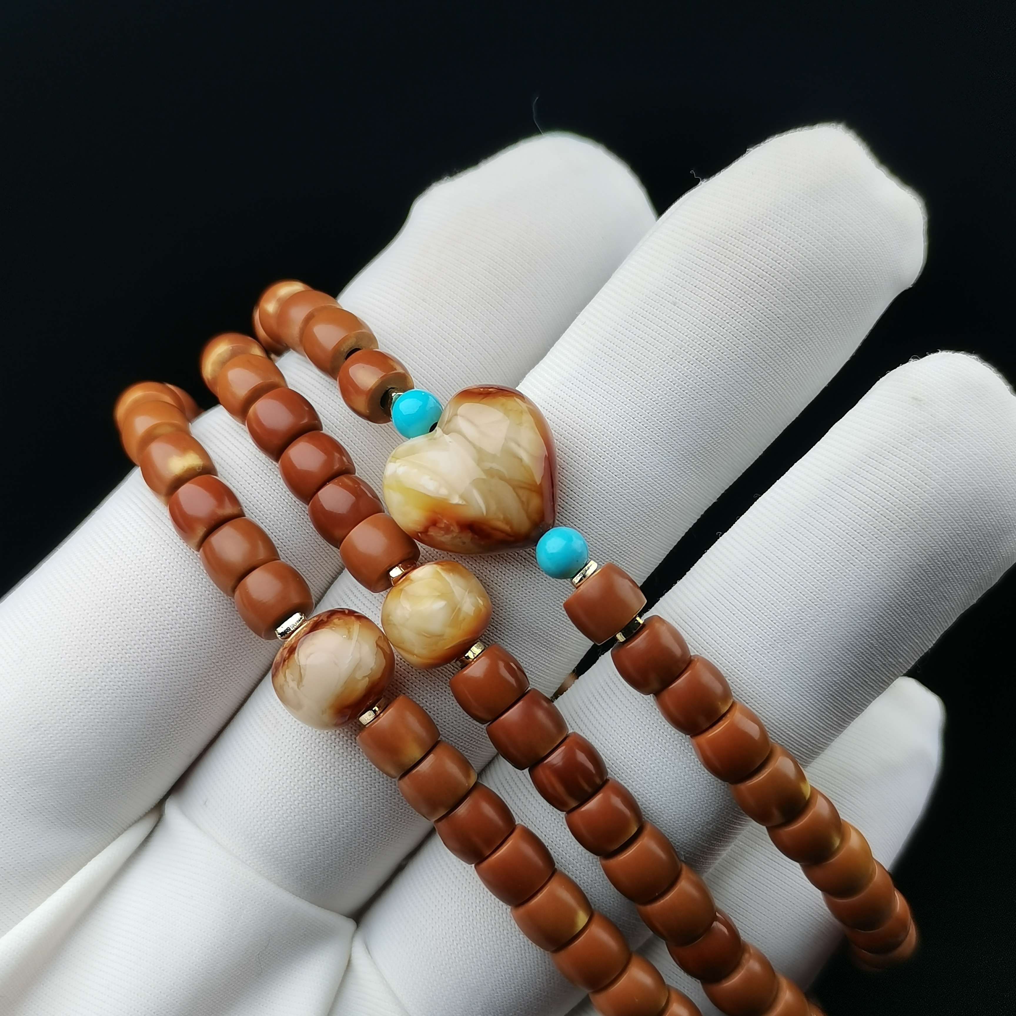 天然原矿琥珀蜜蜡沁色屁桃老型珠核尖5*4mm文玩手串长串绕手三圈