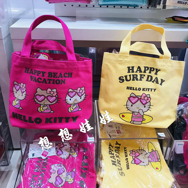 现货日本三丽鸥kitty黑皮夏威夷沙滩帆布包手提袋托特包便当包粉
