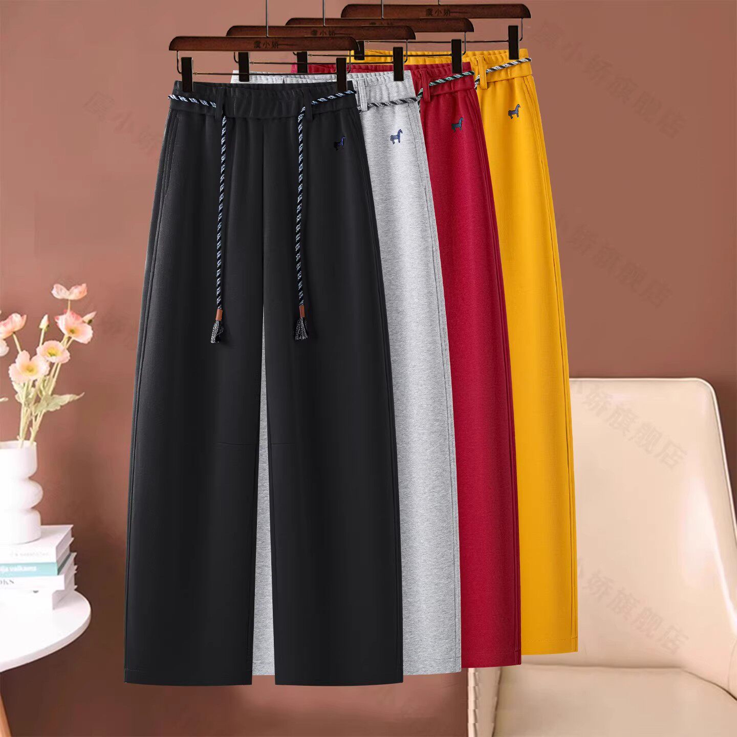 高档流行红色弯刀阔腿裤女春秋季2026新款松紧腰慵懒风香蕉运动裤