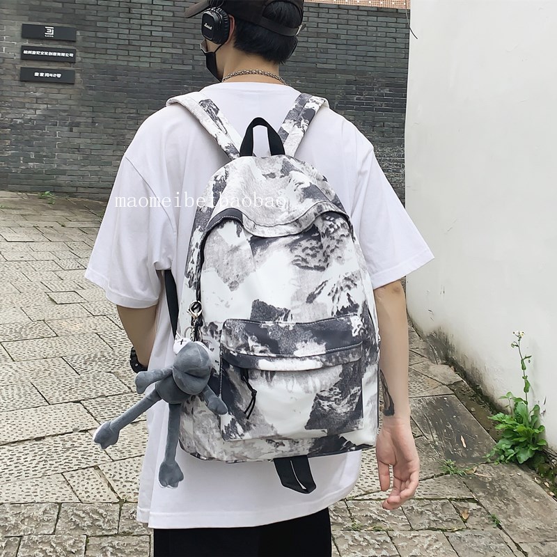 2025新款旅行背包男双肩包女大学生简约印花书包原宿风韩版高中潮