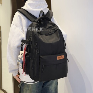 减负护脊书包男生高中生潮流黑色双肩包女旅游轻便大容量电脑背包