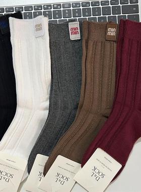 高品质袜子女欧货后侧miu手工布标秋冬中筒袜ins网红安可拉红潮袜