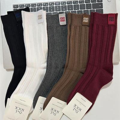 高品质袜子女欧货后侧miu手工布标秋冬中筒袜ins网红安可拉红潮袜
