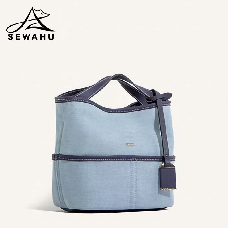 高级感小众菜篮子包包女2026新款小斜挎包通勤手提水桶牛仔单肩包