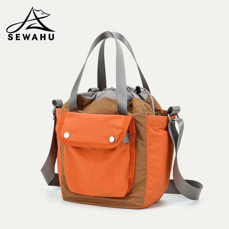 设计感小众斜挎包男女2026新款通勤百搭单肩包休闲轻便手提水桶包