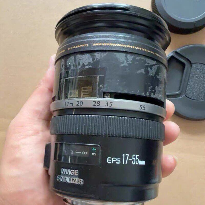 佳能EFS 17-55mm镜头。配件价格出售。图片实物图。成--议价商品