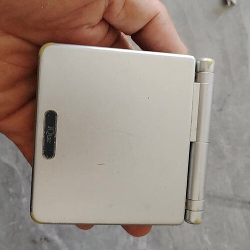 原装任天堂小神游GBASP ique，实物成色如图，正常开机--议价商品