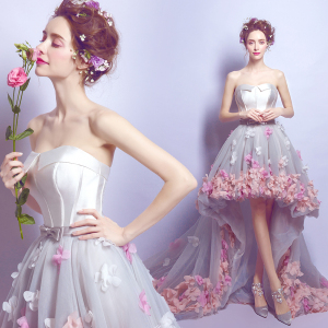 Tailed bride wedding dress after a short long brigade of romantic petals