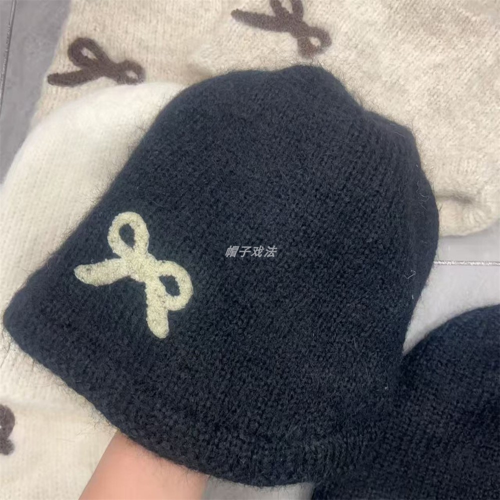 蝴蝶结净版男女网红秋保暖薄情侣羊毛休闲韩版毛线针织堆堆帽冷帽