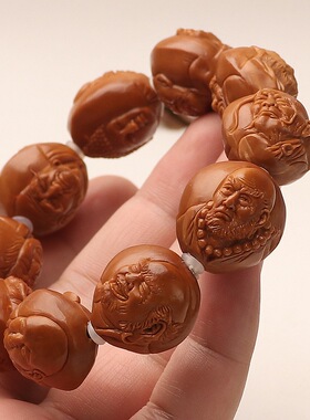 浮雕写实双面手工雕刻十八罗汉橄榄核手串核雕盘玩文玩手把件单圈