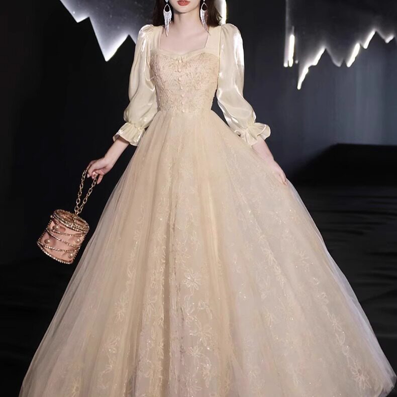 香槟色晚礼服高定轻奢宴会气质主持人轻奢感晚宴年会长袖仙气礼服