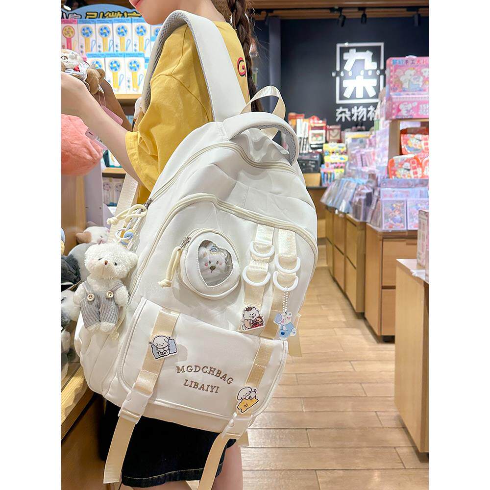 痛包书包初中女生大容量高颜值轻便可爱女孩小学生高中生双肩包女