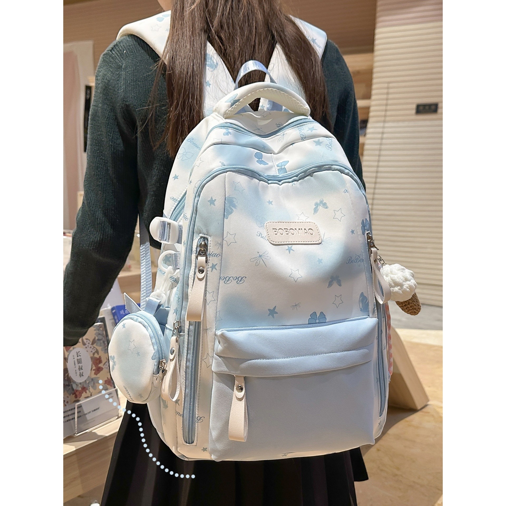 书包初中女生蓝色ins高中高颜值减负护脊2026新款女大容量双肩包