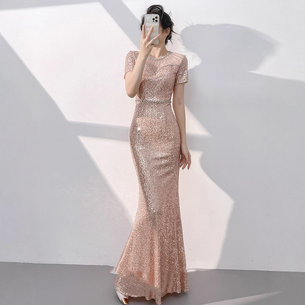 宴会晚礼服女2026新款高级感玫瑰金鱼尾亮片裙重工气质高端主持人