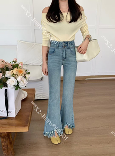 早春新款V线双扣高腰设计感流苏毛边高腰显瘦弹力微喇叭牛仔裤女