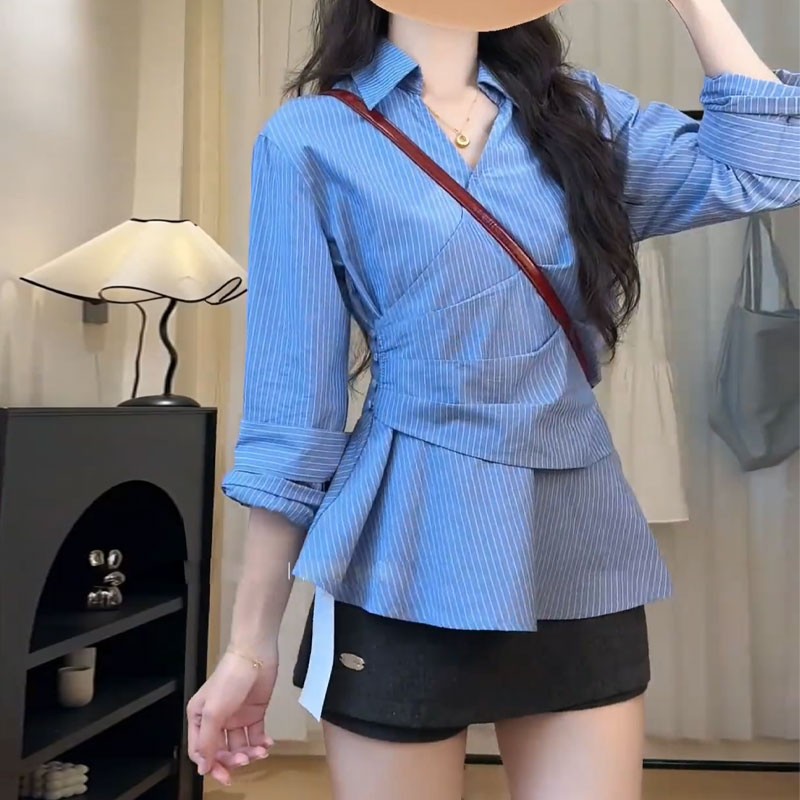 蓝色不规则条纹衬衫女秋装2025年新款设计感褶皱收腰别好气质衬衣