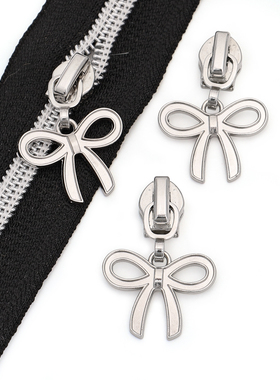 [有锁][5号尼龙拉链专用拉头]白金色勾头配蝴蝶结箱包服装拉链头