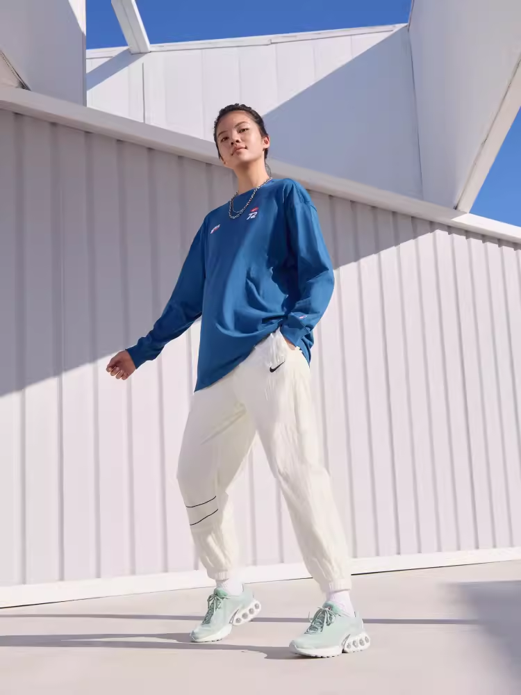 Nike耐克正品女子透气运动休闲DriFIT速干梭织长裤HM9413-133