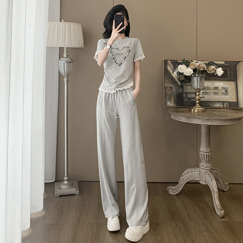 休闲运动套装女夏季2025新款显瘦高级感花边拼接短袖阔腿裤两件套