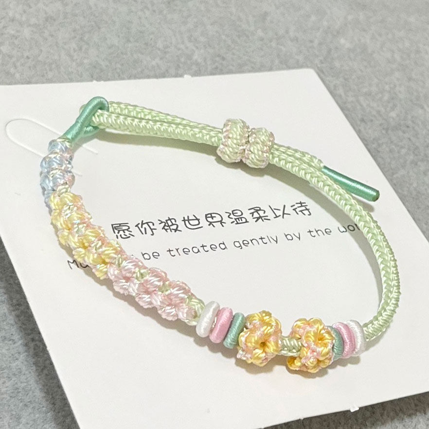 桃花结酒窝结可穿黄金珠的手绳