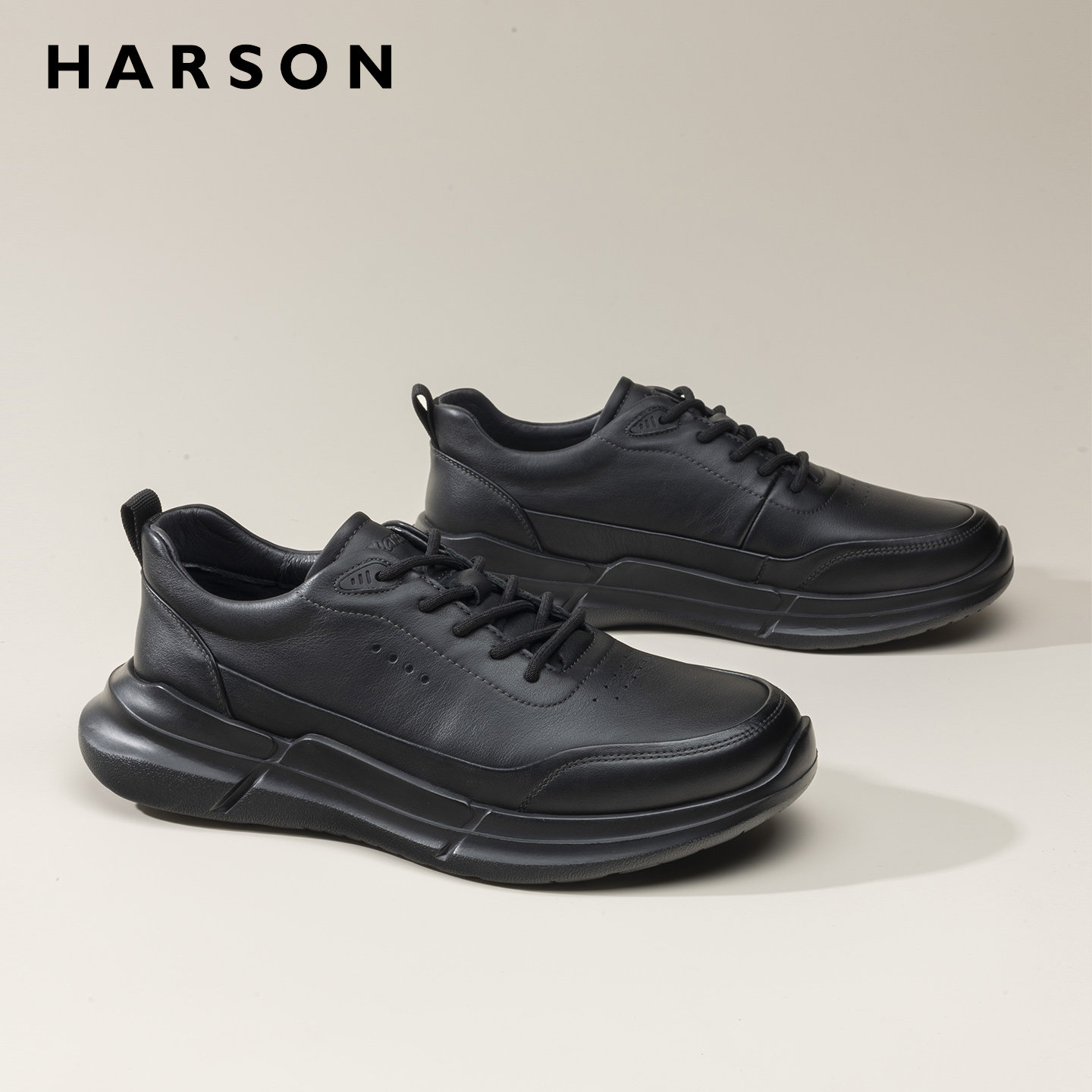 哈森男鞋春季新款男士运动皮鞋全黑软底商务休闲鞋真皮公务通勤鞋