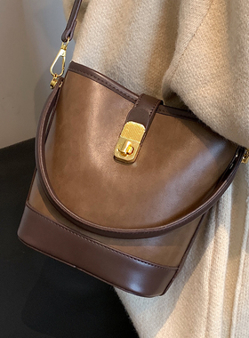 今年流行复古手拎水桶包女包2026新款春季百搭时尚通勤单肩斜挎包